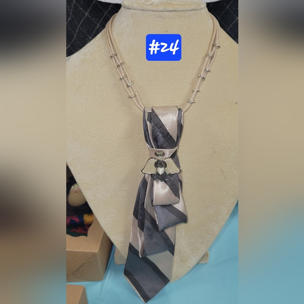 Fashion forward twist on a power tie Necklace
